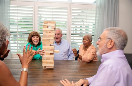 seniors playing a Jenga game